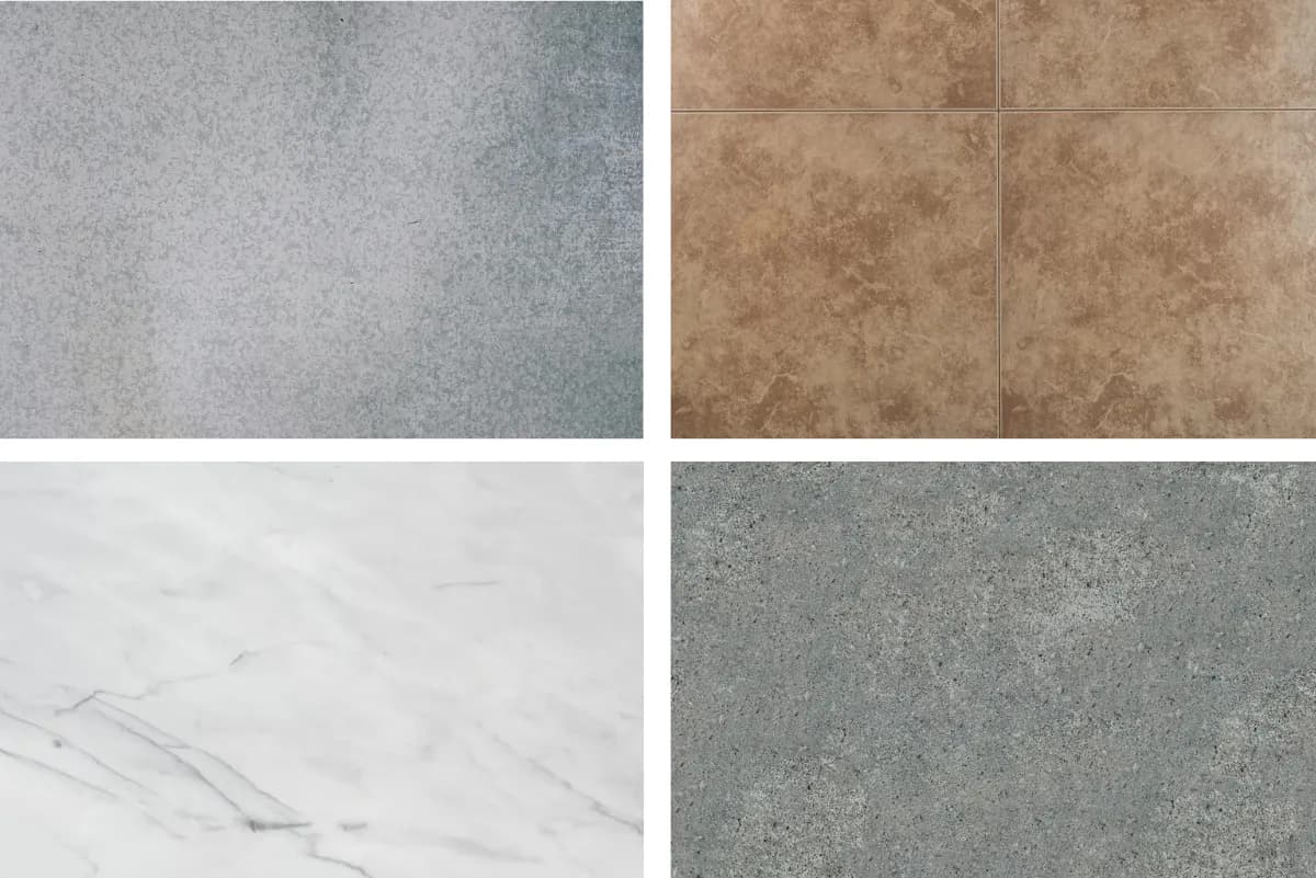 Four floor tile samples arranged in a square — grey concrete, tan travertine, white marble, and mottled green stone