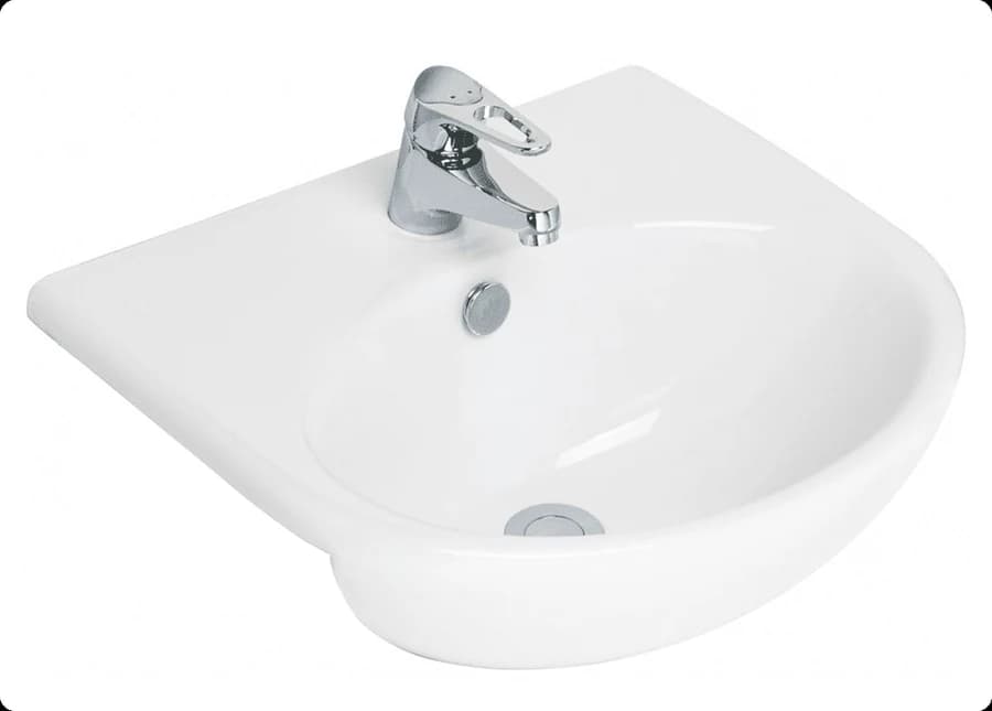 A white semi-recessed basin with a chrome mixer