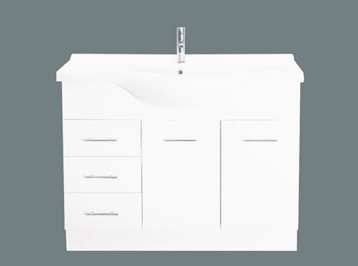 A wide white semi-recessed vanity with drawers on the left
