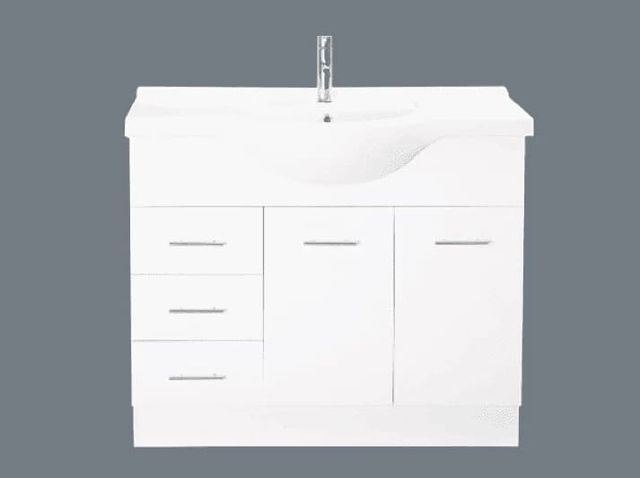 A wide white semi-recessed vanity with doors and a bank of drawers