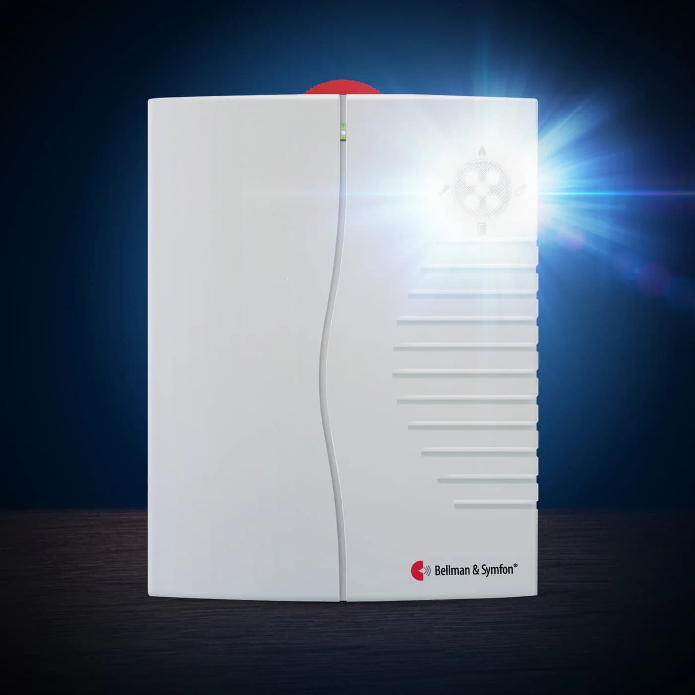 A Bellman portable receiver giving off a bright flash in a dark room
