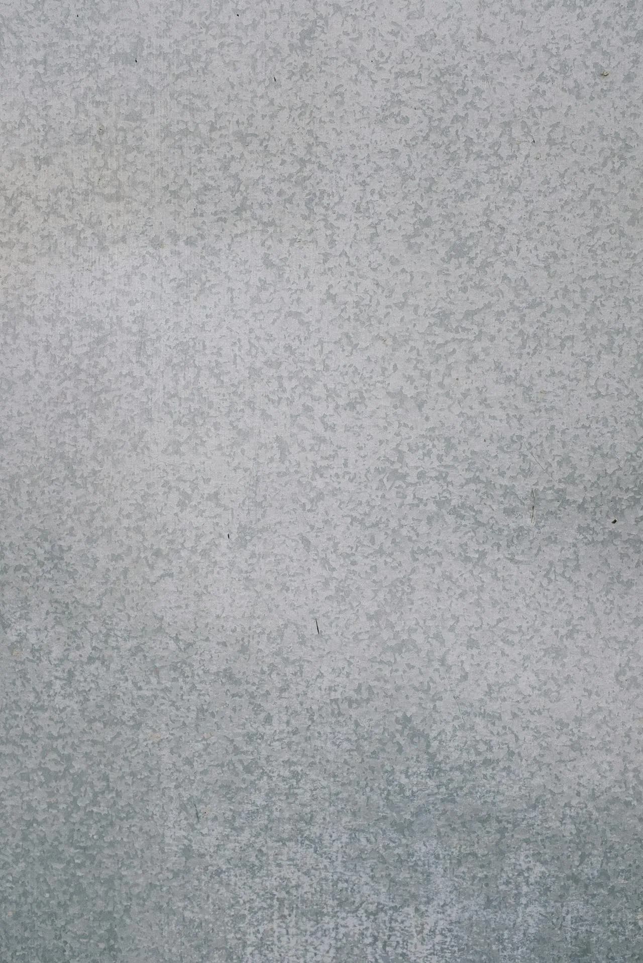 A light grey floor tile with a fine, even stone texture