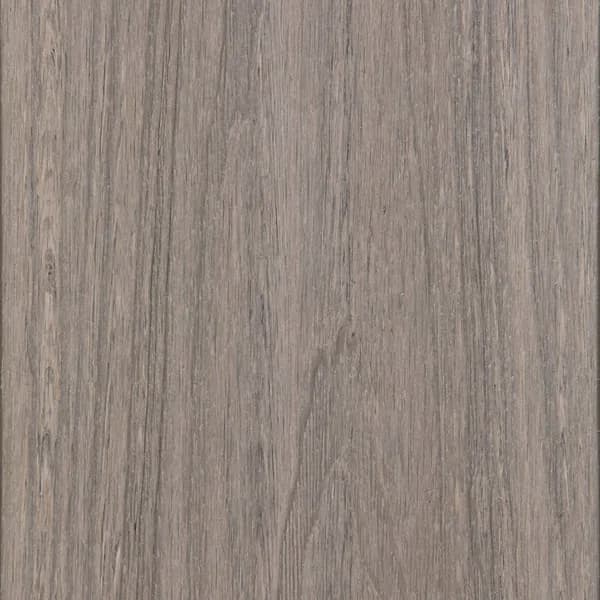 Composite decking board in Sand Dune, a pale sandy woodgrain finish