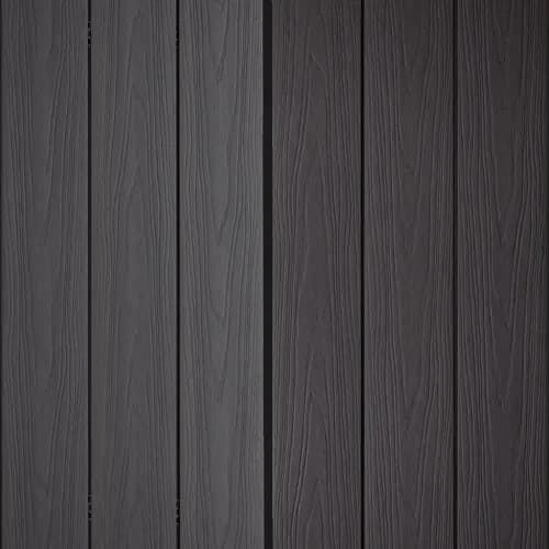 Composite decking boards in a dark charcoal tone with a subtle grain