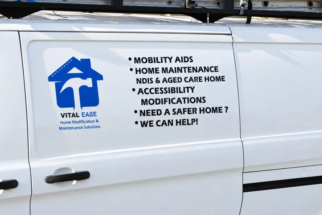 The side of the Vital Ease van: mobility aids, home maintenance, NDIS and aged care, accessibility modifications, and the phone number