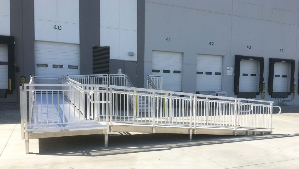 aluminium modular ramp sections bolted together on a patio